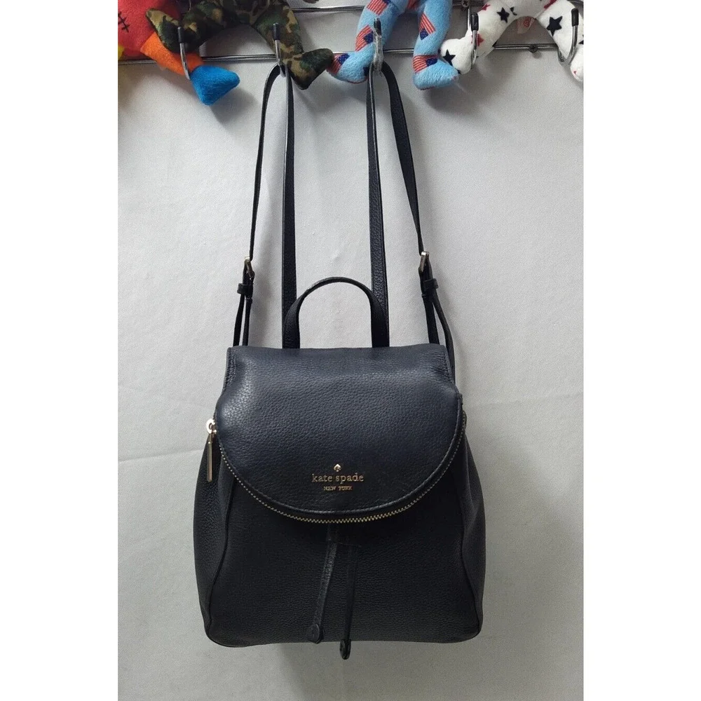 Kate Spade New York Black Pebbled Leather Zipper Flap Drawstring Backpack